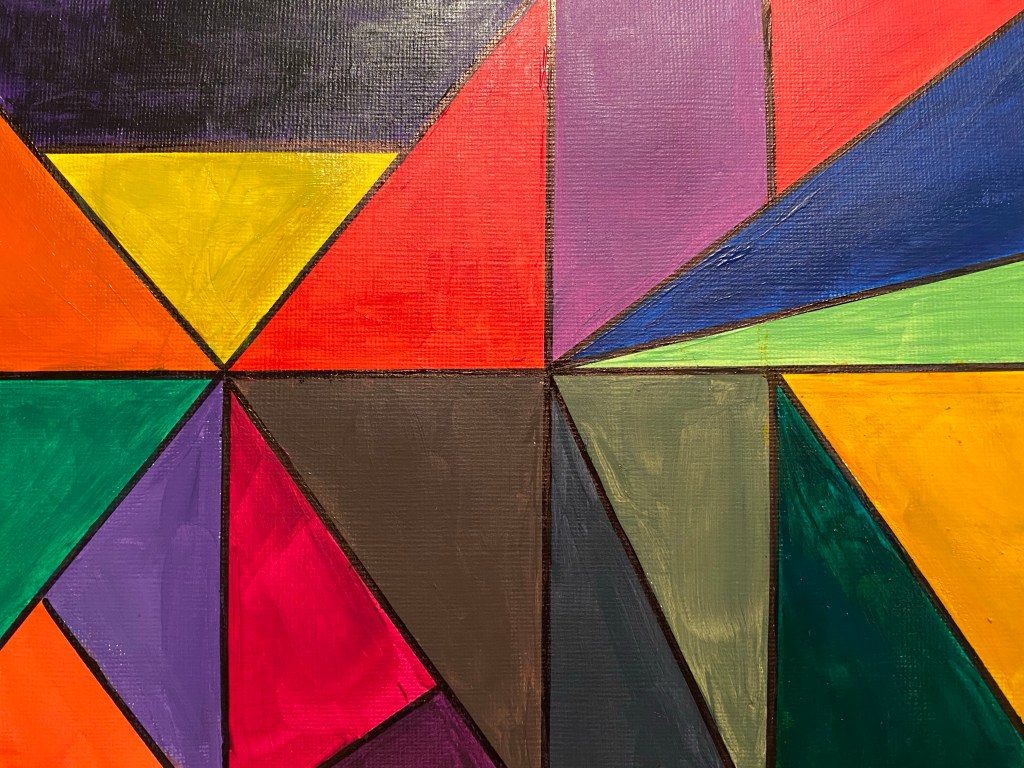 Multi-coloured geometric print, mostly triangles, with a couple of quadrilaterals, in acrylic paint.